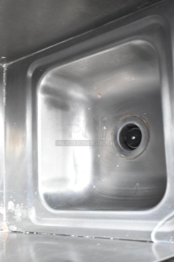 Stainless steel sink inside a BRAND NEW 2021 Titanium Cargo 28' food trailer. Ready for custom mobile kitchen buildout.