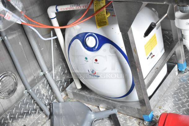 BRAND NEW 2021 Titanium Cargo 28' Shell Food Trailer features sinks, grease hood, shelving, and Ecotemp water heater. Clear title.