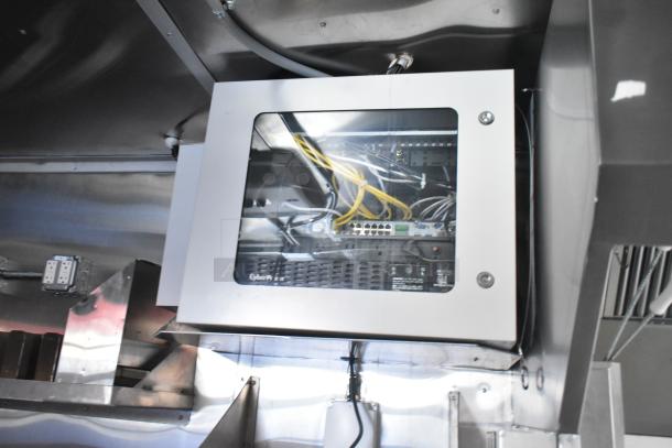 28' Titanium Cargo food trailer interior with integrated security system and wiring. Premium condition, ready for customization.