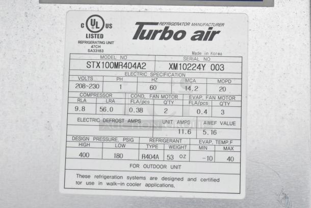 "Turbo Air refrigerating unit label showing model STX100MR404A2, voltage 208-230, and refrigerant R404A details."