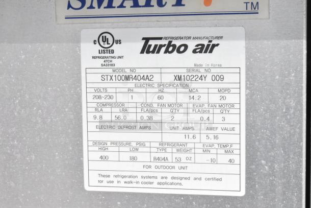 Label showing specifications for a Turbo Air refrigeration unit, model STX100MR404A2, for walk-in cooler applications.