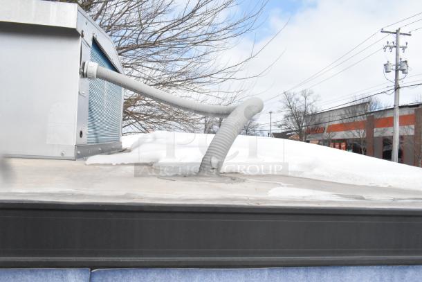 2020 Southern Dimensions 8.5'x24' enclosed trailer rooftop view, showing insulated structure and cooling unit.