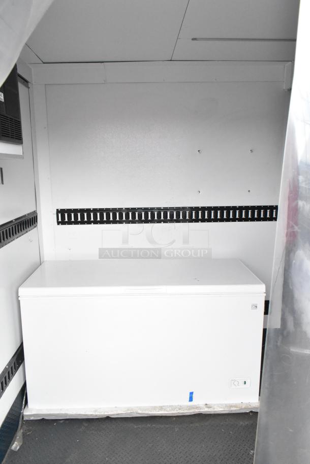 2020 Southern Dimensions 8.5' x 24' enclosed trailer interior, insulated for mobile cooler use. Visible freezer unit, used condition.