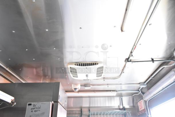 Interior view of a 2020 Continental Cargo mobile kitchen trailer, showing HVAC and lighting system, metal finish.