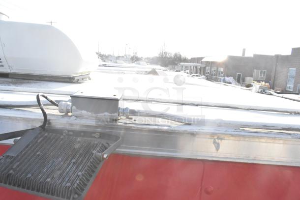 Roof view of a 2021 Titanium Cargo mobile kitchen trailer, showing electrical and HVAC components.