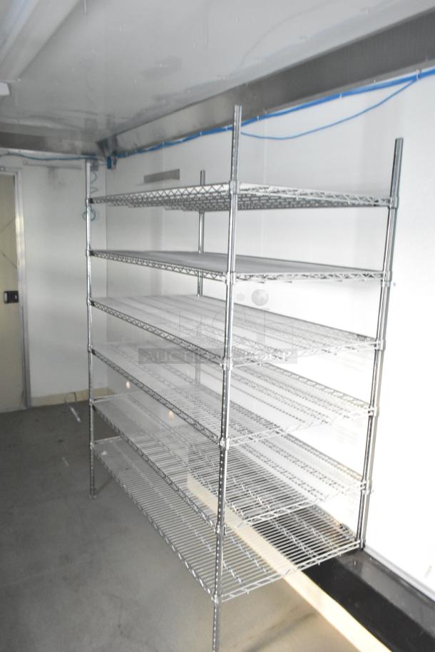 2021 Diamond Cargo 8.5' x 24' trailer interior with metal Metro shelving, climate-controlled, ideal for mobile storage.