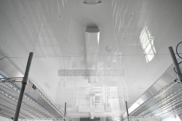 2021 Diamond Cargo 8.5' x 24' trailer interior with Metro shelving and white panel ceiling. Climate-controlled and IT-equipped.