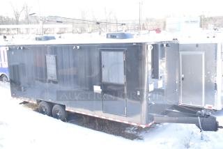 2021 Southern Dimensions 8.5' x 24' mobile cold storage trailer, near-new, tandem axle, black exterior, clear title.