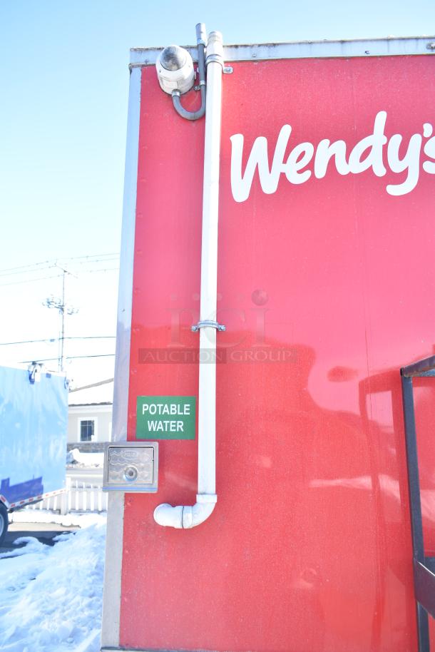 Red Rock Solid Cargo fast-food trailer with "Wendy's" branding and potable water signage. New in 2022, fully outfitted.