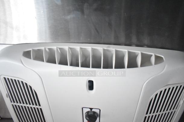 Close-up of CaptiveAire grease hood vent from the Rock Solid Cargo fast food trailer’s kitchen setup.