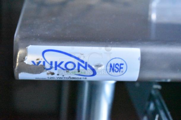 Sticker on a commercial kitchen appliance reads "VUKON Metal" with NSF certification. Model: 120-YWT9M90418.