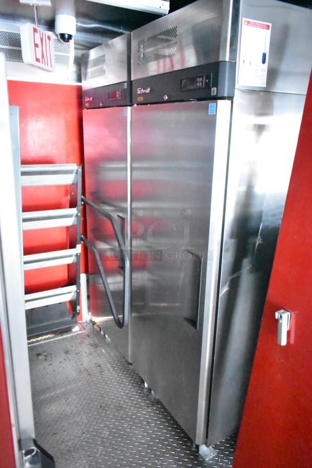 Rock Solid Cargo mobile kitchen interior featuring commercial-grade refrigerators, shelving, and ventilation system.