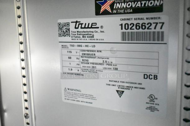 Label on refrigeration unit for Rock Solid Cargo mobile kitchen, model TSD-09G-HC-LD, details specs like refrigerant R290.