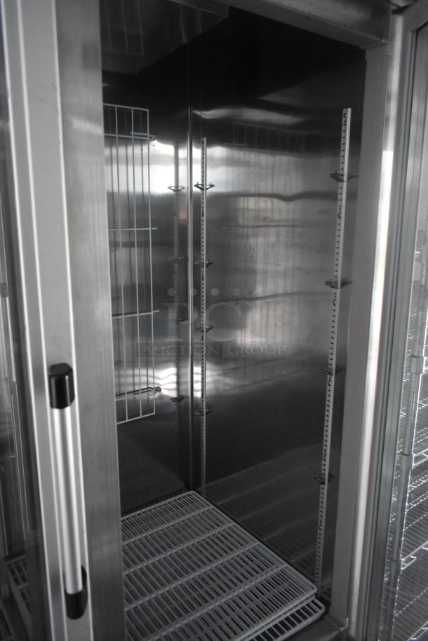 Interior view of Southern Dimensions 24' cold food trailer with wire shelving and commercial-grade stainless-steel surfaces.