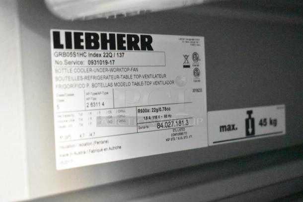 Liebherr label on cooler shows model GRB05S1HC, serial number 84.027.181.3, max weight 45 kg, made in Austria.