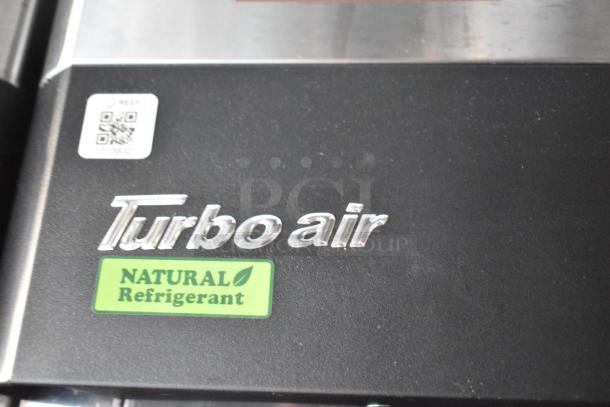 Turbo Air cooler label with "Natural Refrigerant" tag and QR code, indicating eco-friendly cooling technology.