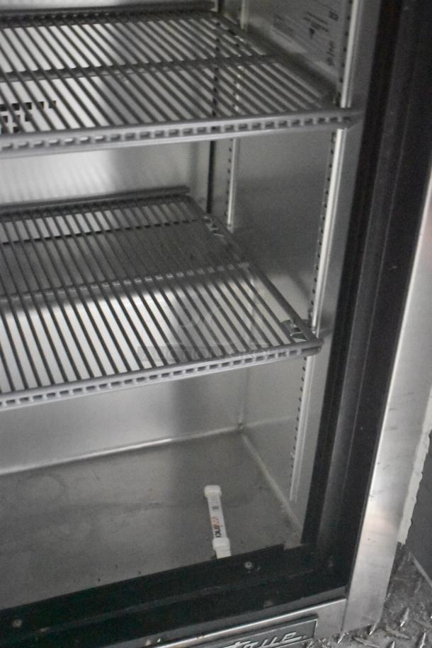 Liebherr cooler interior with wire shelves in a 28' Wendy's fast food trailer. Commercial-grade, working condition.