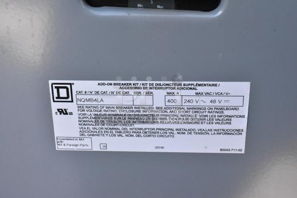 Label on Wendy's Fast Food Trailer: Add-on breaker kit details model NQMB4LA, 400 A, 240 V, for voltage rating compliance.