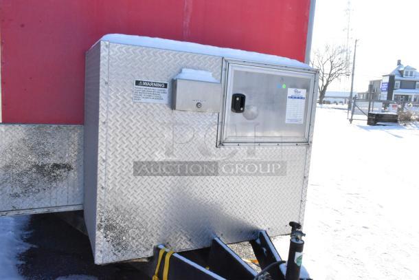 28' Wendy's fast food trailer with diamond plate exterior and visible utility access panel. Ready for mobile kitchen use.