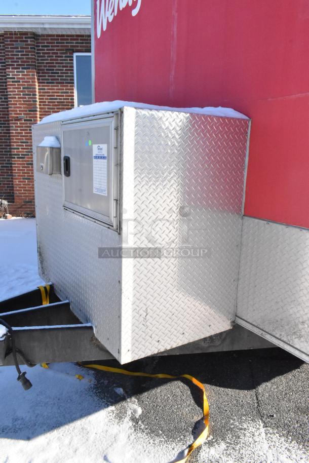 28' Wendy's fast food trailer with diamond plate exterior. Features commercial kitchen equipment and branding. Clear title.
