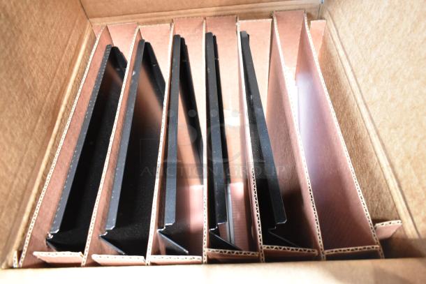 Cardboard packaging containing black panels for 2025 True TVM-48SL-HC cooler; new condition, organized in sections.