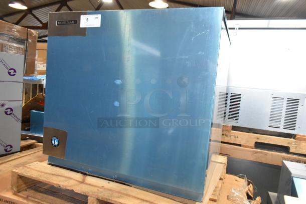 Brand new Hoshizaki KMS-1402MLJ commercial ice machine head; 115-120V, 1 phase, pristine condition, label visible.