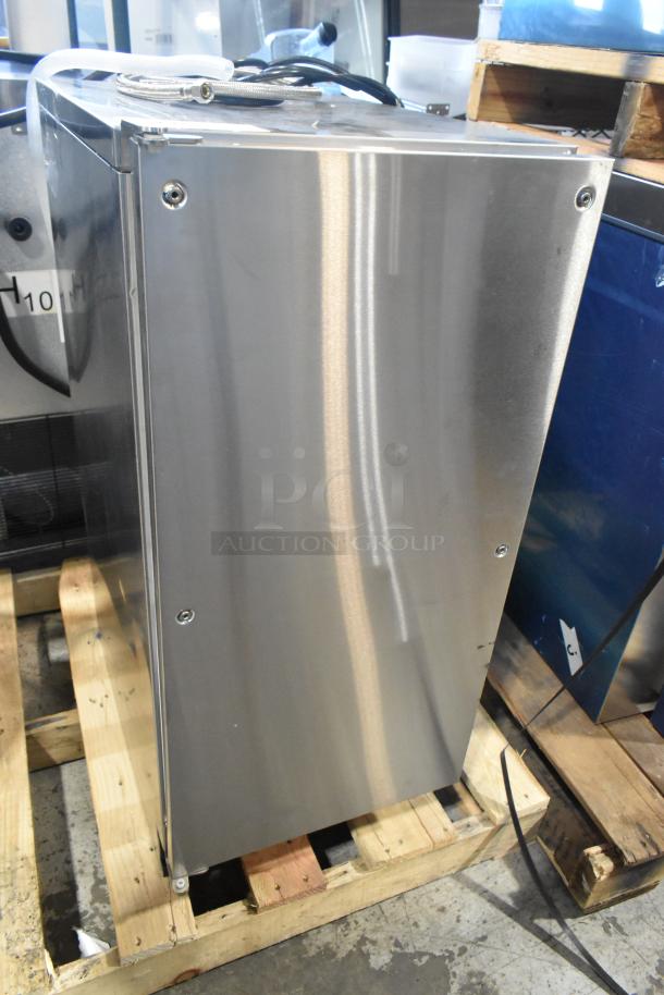 Brand new Hoshizaki AM-50BAK-DS ice machine, 115V, 54 lbs/day, stainless steel, commercial use, unboxed on pallet.