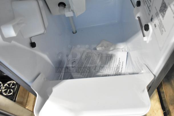 Brand new Hoshizaki AM-50BAK-DS ice machine interior, undercounter design, with documents included. Makes 54 lbs/day.