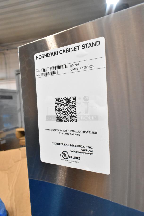 2025 Hoshizaki SD-750 icemaker stand with lockable doors, new condition, model and serial number label visible.