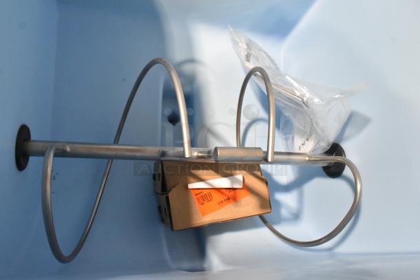 Brand new Hoshizaki DB-200H ice dispenser, 200 lb storage, inside view, includes metal rod and boxed components.