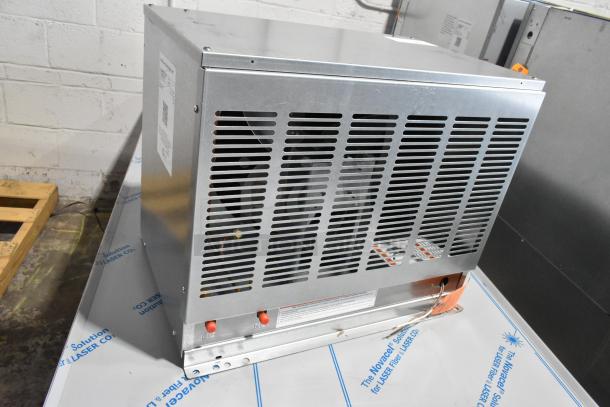 Brand new Hoshizaki URC-5FZ commercial ice machine compressor, 115V, 1 phase. Metal casing, vented design, visible labels.