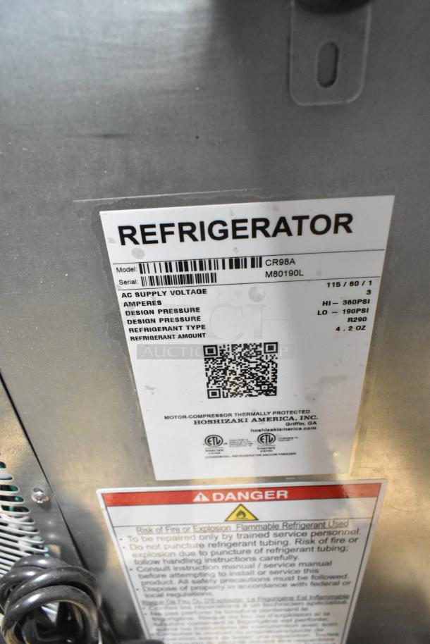 Label on Hoshizaki CR98A commercial refrigerator. Shows model, voltage 115, phase 1, and refrigerant type R290.