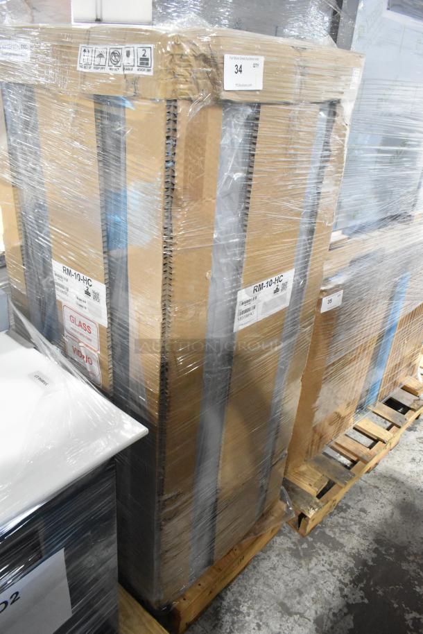 Brand new 2026 Hoshizaki RM-10-HC single door cooler in packaging. 115V, 1 phase, with model label visible.