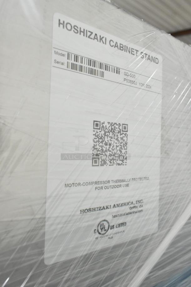 Brand new 2024 Hoshizaki SD-500 icemaker/dispenser stand with lockable doors. Features model, serial number, and UL label.