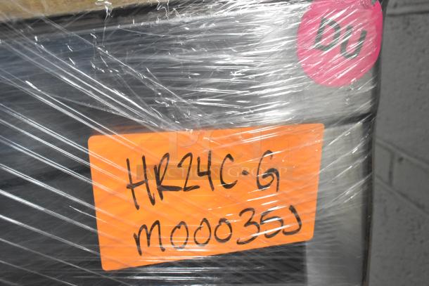 Brand new Hoshizaki HR24C-G commercial undercounter single door cooler, wrapped for shipping. Model label HR24C-G visible.