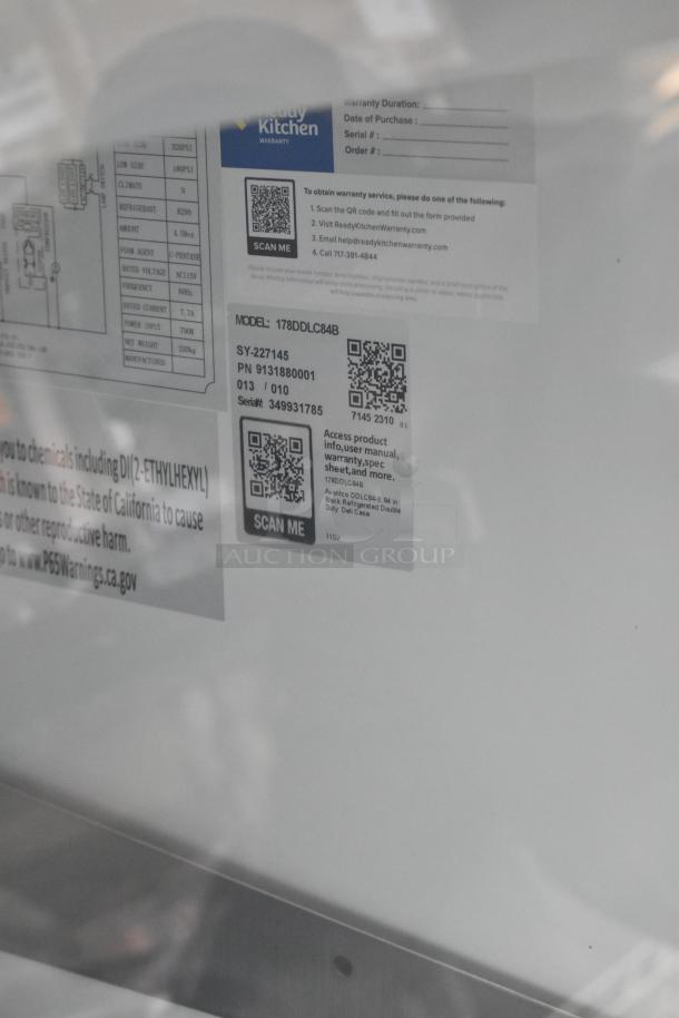 BRAND NEW Avantco 178DDLC84B 84" black glass refrigerated deli case. Tags show model and serial number for warranty access.