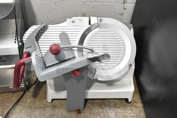 Berkel X13A commercial meat slicer, 120V, 1 phase, with adjustable blade, sturdy base, and safety guard. Excellent condition.