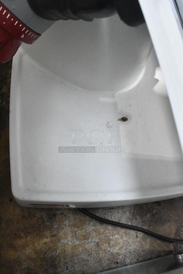 Berkel X13A Commercial Countertop Meat Slicer, 120V, 1 Phase. Visible light wear on base. Ideal for deli use.