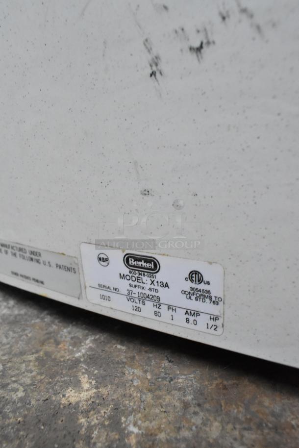 Berkel X13A Commercial Meat Slicer label, showing model, serial number, 120V, 1 phase, conforms to UL Std 763.