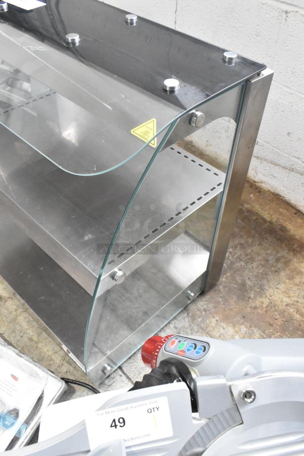 Omcan countertop heated 2-tier warming display, stainless steel, glass sides, warning label visible, excellent condition.