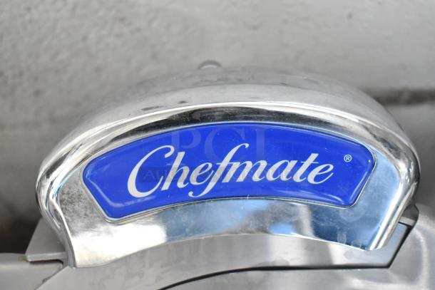Globe Chefmate GC512 commercial meat slicer with blade sharpener, stainless steel finish, featuring a prominent "Chefmate" label.