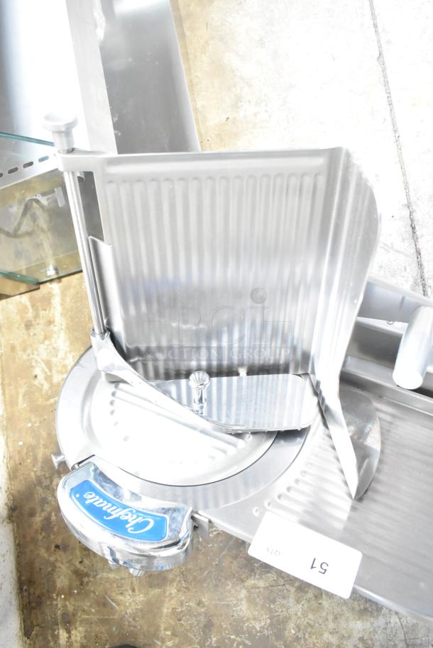 Globe Chefmate GC512 commercial meat slicer with blade sharpener. Stainless steel, 115 volts, 1 phase. Appears in good condition.
