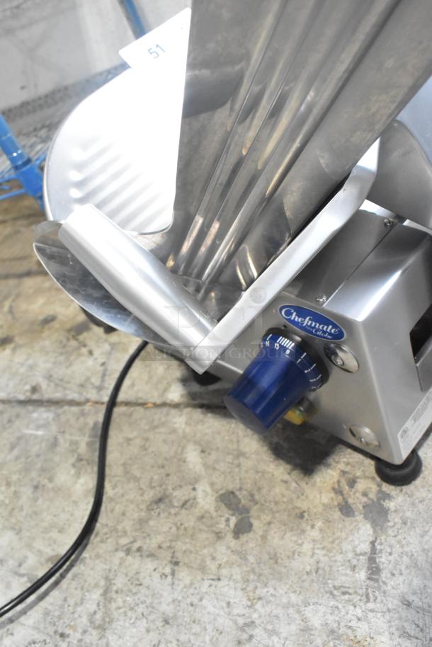 Globe Chefmate GC512 commercial meat slicer with blade sharpener, 115 volts, 1 phase, visible control knob and markings.