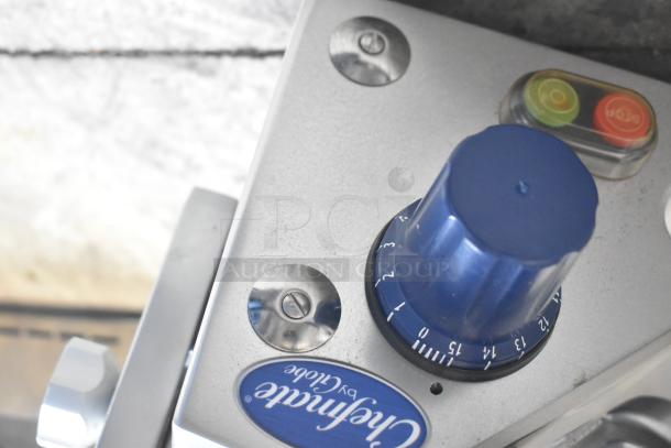 Globe Chefmate GC512 meat slicer, blue knob, 115V, visible brand logo, countertop model with blade sharpener.