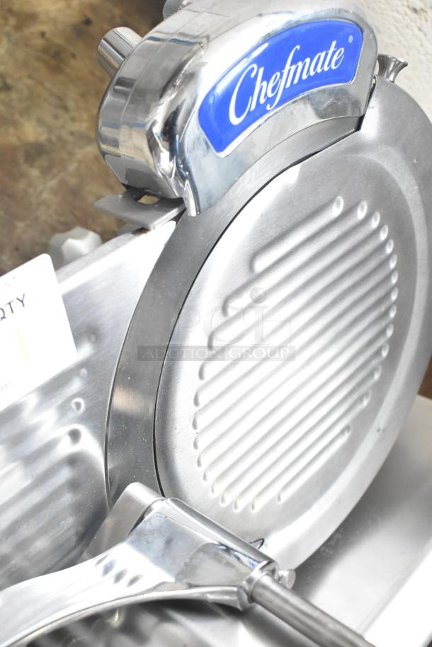 Globe Chefmate GC512 commercial meat slicer with blade sharpener, stainless steel, 115 volts, 1 phase, excellent condition.