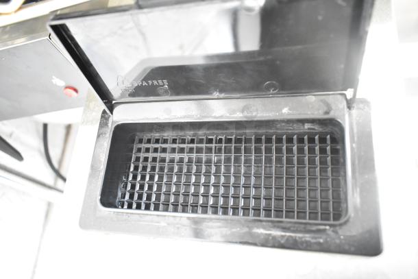 Galaxy 177GCM2B Pourover Coffee Maker drip tray, BPA-free label visible, black grid design, commercial use, toggle controls.