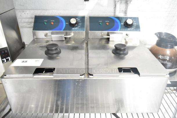 Brand new 2023 Hoocoo FRY-20L stainless steel dual deep fat fryer, 120V, with 2 metal baskets and lids.