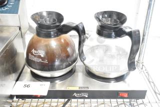 Avantco 177W52 countertop 2 burner coffee pot warmer with 2 pots. Features on/off switch, hot surface warning. 120 volts, 1 phase.