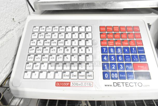 Detecto DL1030P 30 lb digital price computing scale with label printer, pole display, numeric and function keypad.