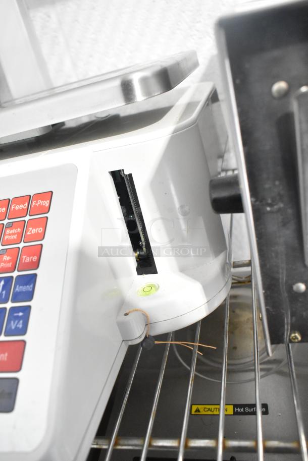 Detecto DL1030P 30 lb digital scale with label printer and pole display, features buttons for functions like "Print" and "Zero".